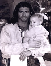 Joe Lando holding Megan Calabrese as baby Katie